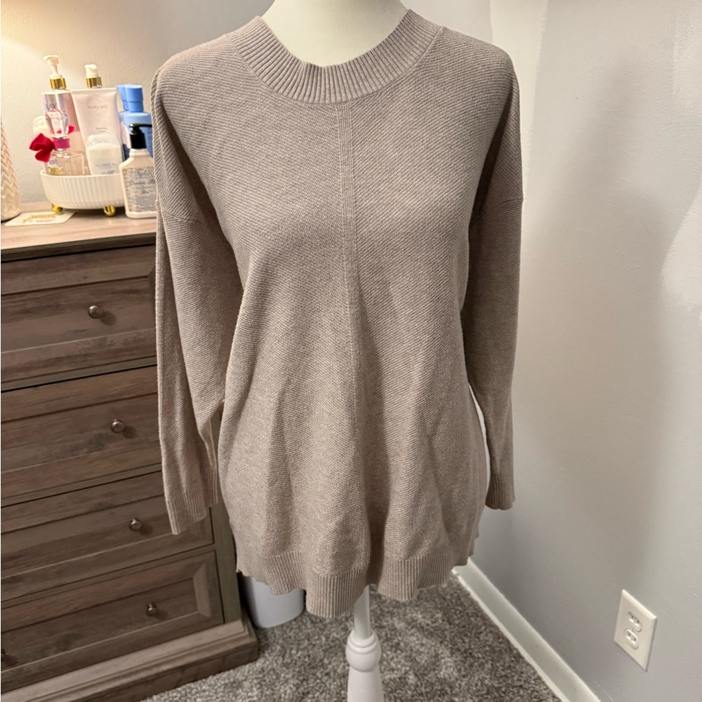 Light tan/nude sweater, lightly used